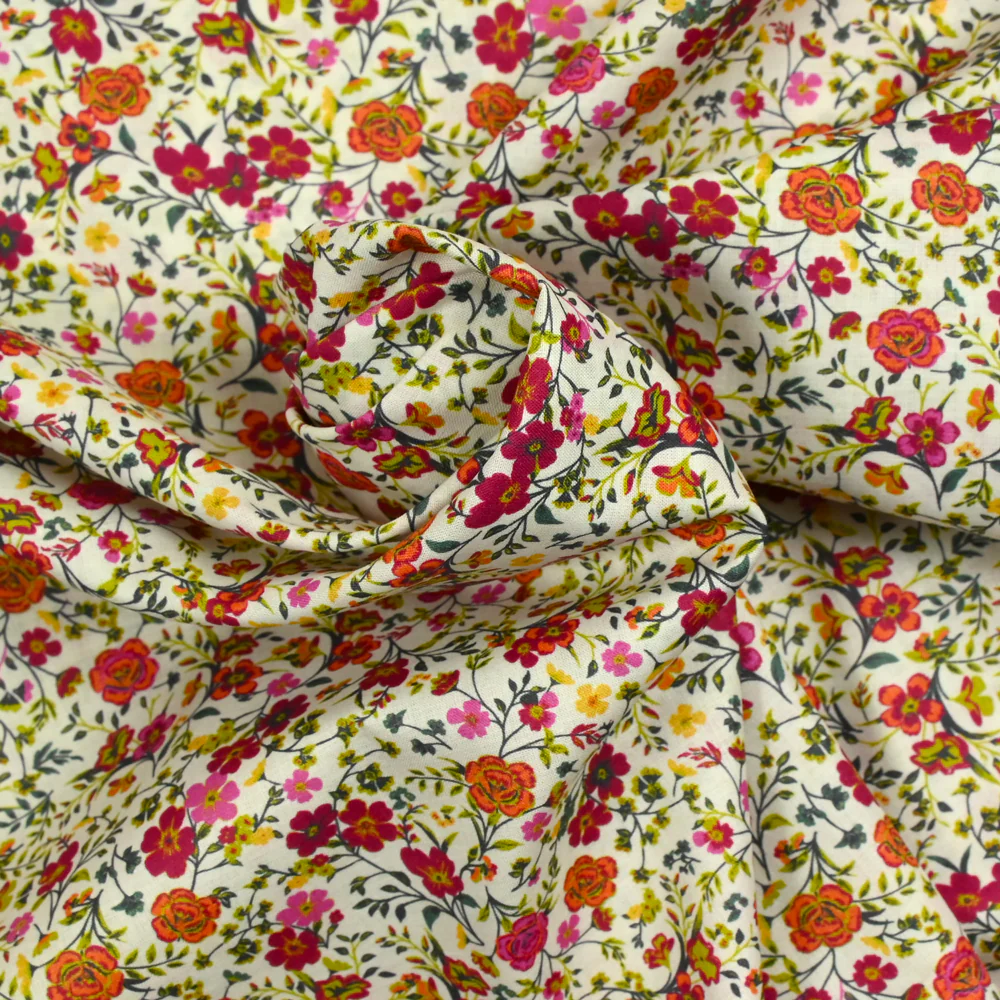 Coton imprimé Greta fleurs fuchsia et orange fond blanc au mètre - Image 3