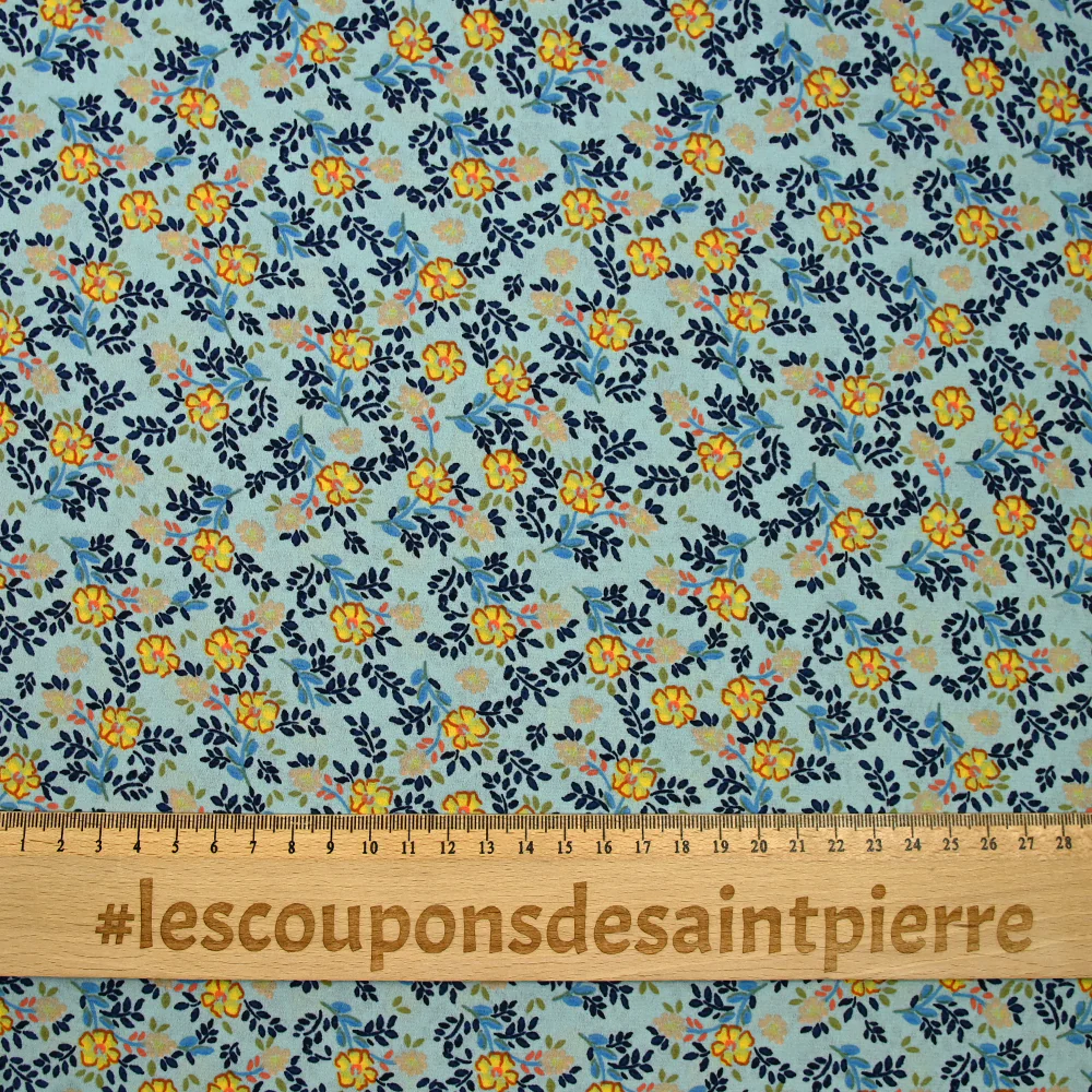 Crêpe de polyester imprimé micro pousses marine fond bleu - Image 3