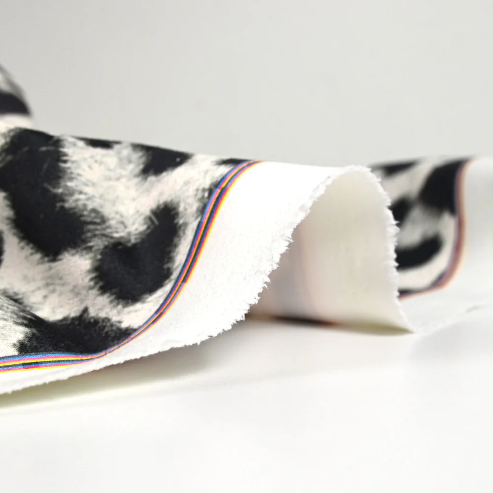 Scuba toucher suédine imprimé léopard fond blanc - Image 5