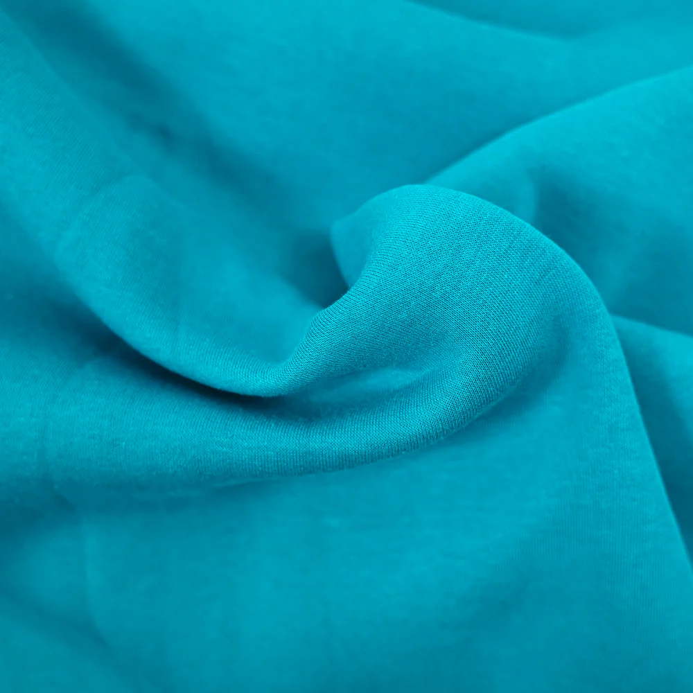 Tissu sweat minkee épais turquoise - Image 4